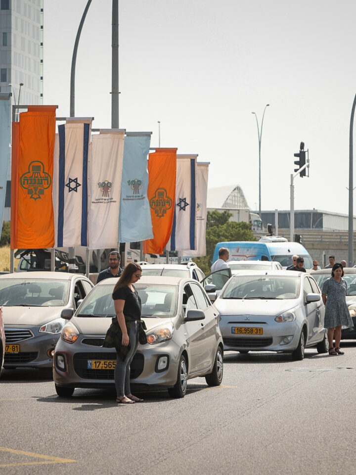 People stand still on a highway in Ra'anana as a two-minute siren is sounded across Israel to mark Holocaust Remembrance Day on April 28, 2022. Today marks the annual memorial day commemorating the six million Jews killed by the Nazis in the Holocaust during World War Two. Photo by Yossi Aloni/Flash90