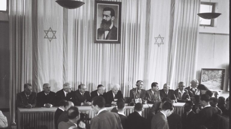 David Ben-Gurion, center, preparing to read the Declaration of Independence of the State of Israel in what would become Independence Hall, May 14, 1948. Photo by Zoltan Kluger/Government Press Office