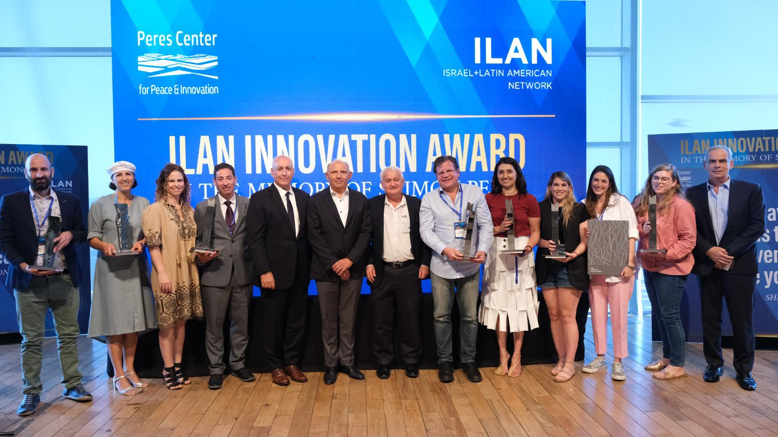 Chemi Peres and Isaac Assa with recipients of the first Israel Latin America Network awards, June 9, 2022. Photo courtesy of ILAN