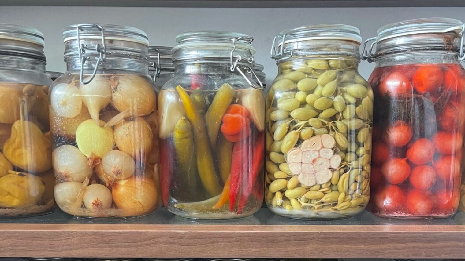 Jars of pickled fruits and vegetables in the kitchen/lab of Noa Herzberg, the Serial Pickler. Photo by Noa Berman-Herzberg