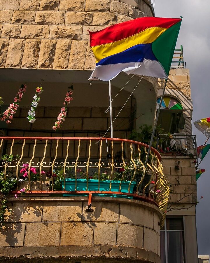 A Druze flag flies in Daliat el-Carmel. Photo by Harvey Sapir Photography via Pikiwiki Israel