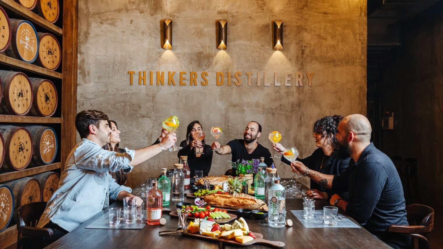 Visitors enjoying the spirits and the spirit at Thinkers Distillery in Jerusalem. Photo by Itamar Ginzburg