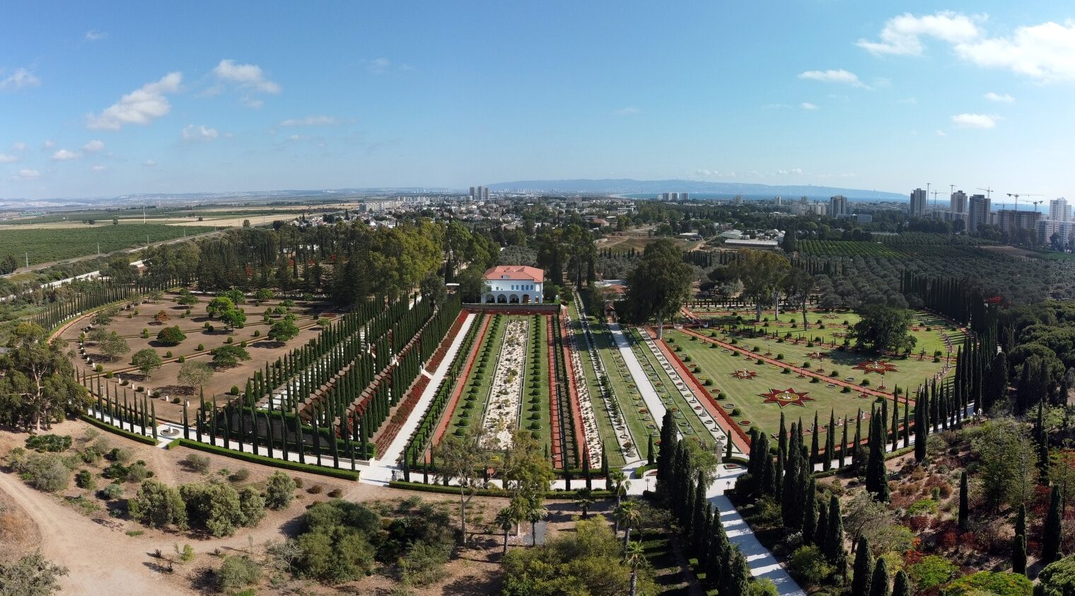 Photo of the Bahá’í Gardens in Akko by Eli Schwartz via Shutterstock.com