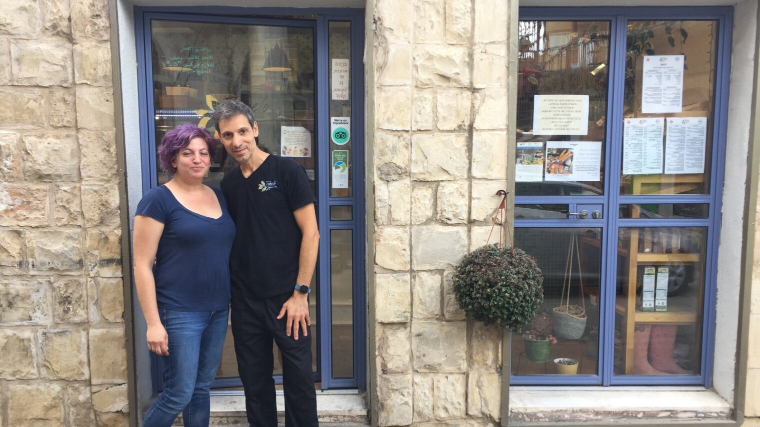 Vered Baer and Morad Bishara in front of their Tupelo Bakery in Ma’alot-Tarshiha. Photo by Diana Bletter