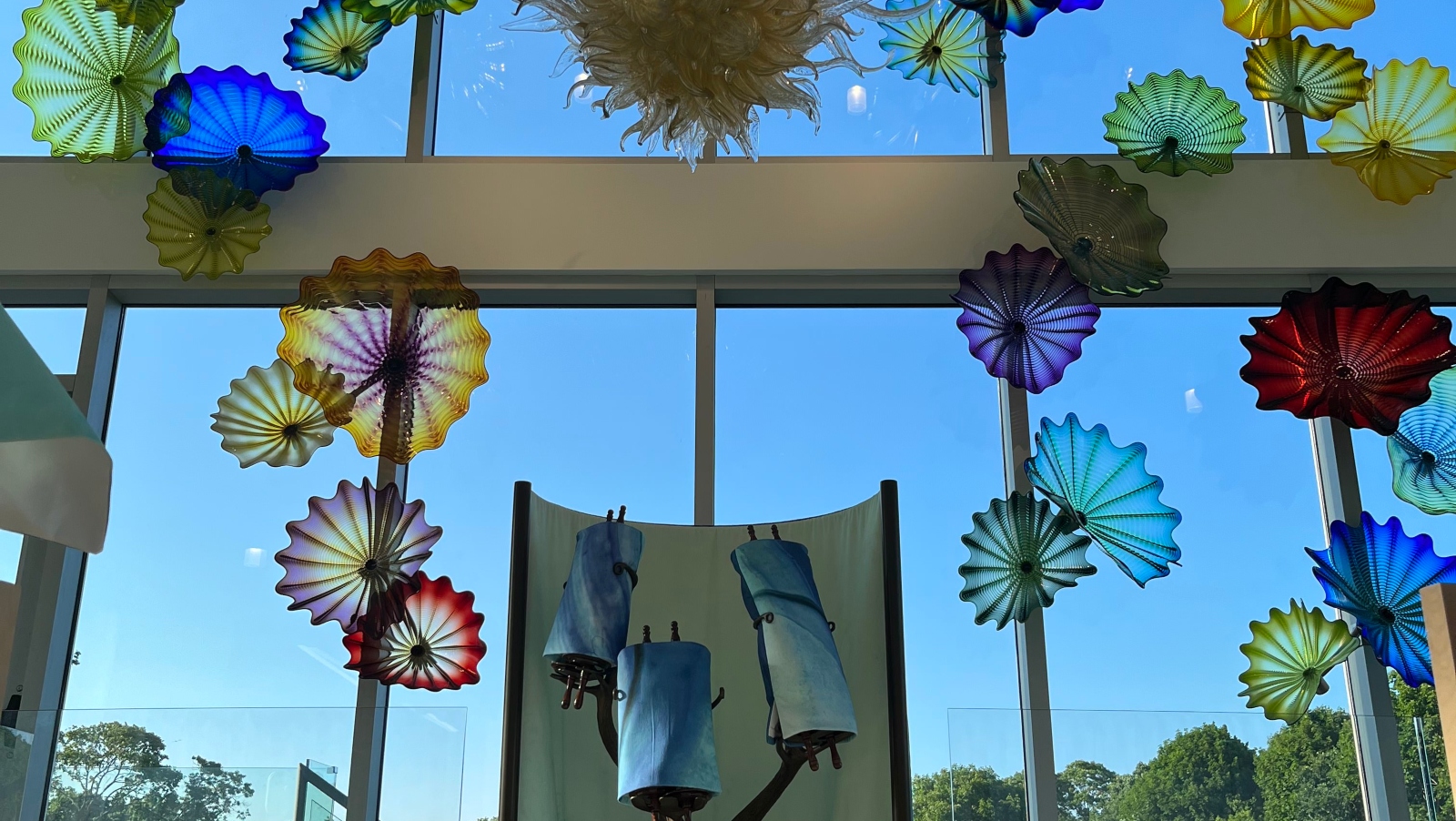 Dale Chihulyâ€™s glass installation is accompanied by fabric decorations created using digital textile printing technology. Photo courtesy of Kornit Digital. Â© 2022 Chihuly Studio. All rights reserved