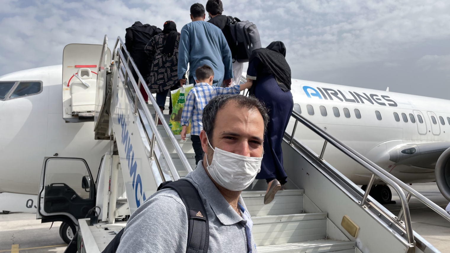 IsraAID CEO Yotam Polizer boarding the plane during the evacuation of Afghan refugees in 2021. Photo courtesy of IsraAID
