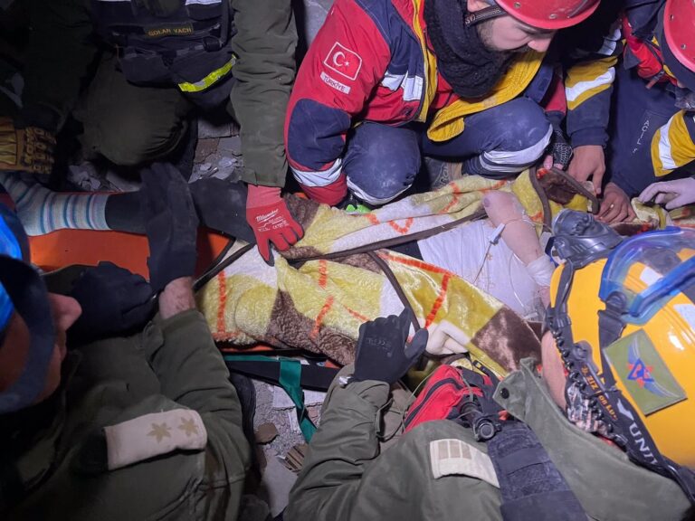 Israelâ€™s IDF rescuers pull a woman out of collapsed building on February 7, 2023. Photo courtesy of Israel Defense Forces