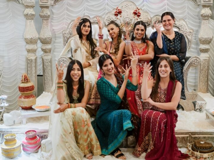 Revital Moses (in green) at her cousin’s Israeli Indian wedding. Photo by Sabres Photography