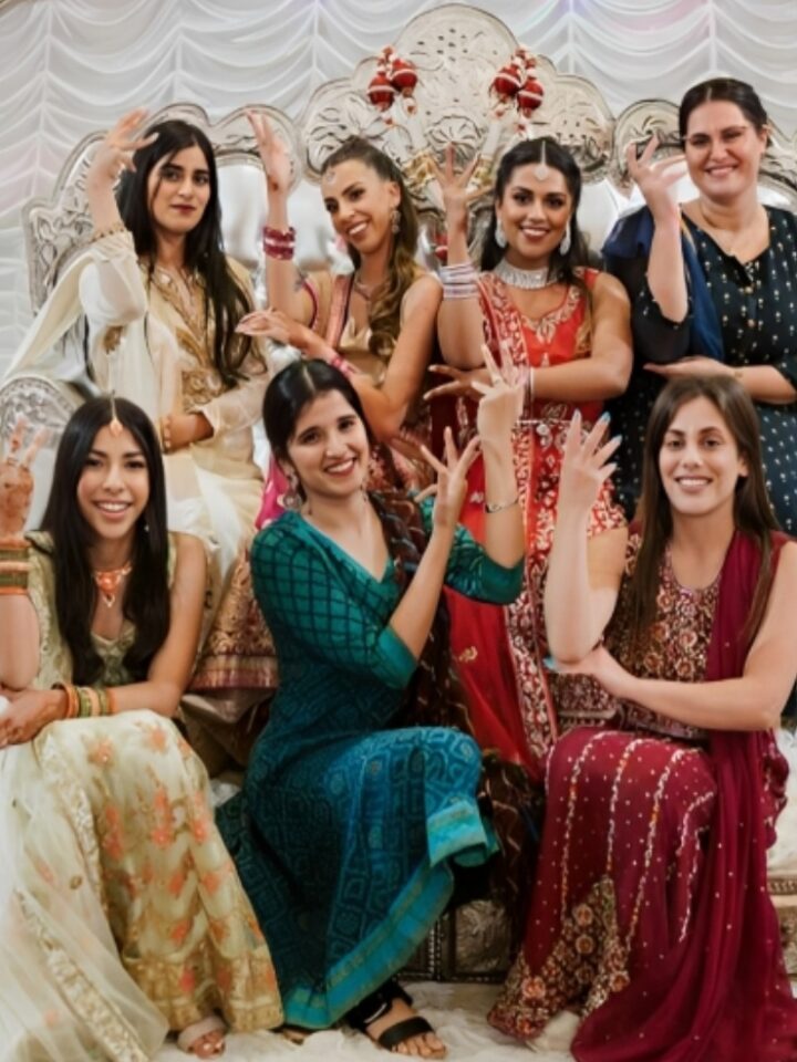 Revital Moses (in green) at her cousin’s Israeli Indian wedding. Photo by Sabres Photography