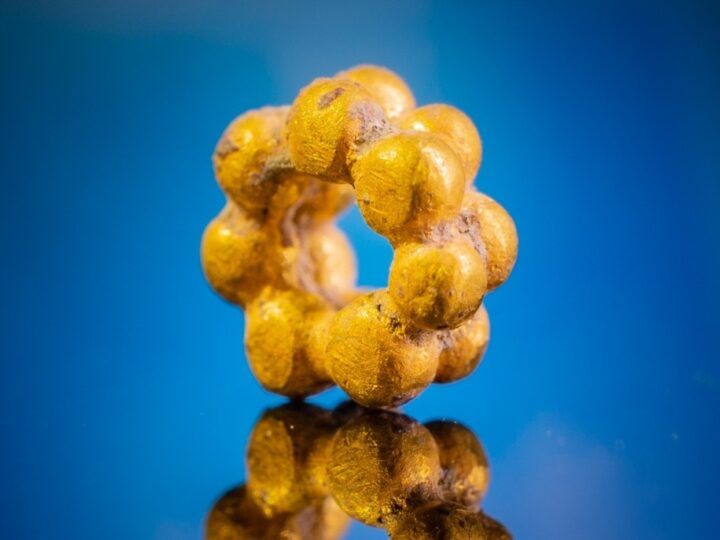 The gold bead which was discovered in Israel Antiquities Authority excavations in the City of David. Photo by Koby Harati/City of David