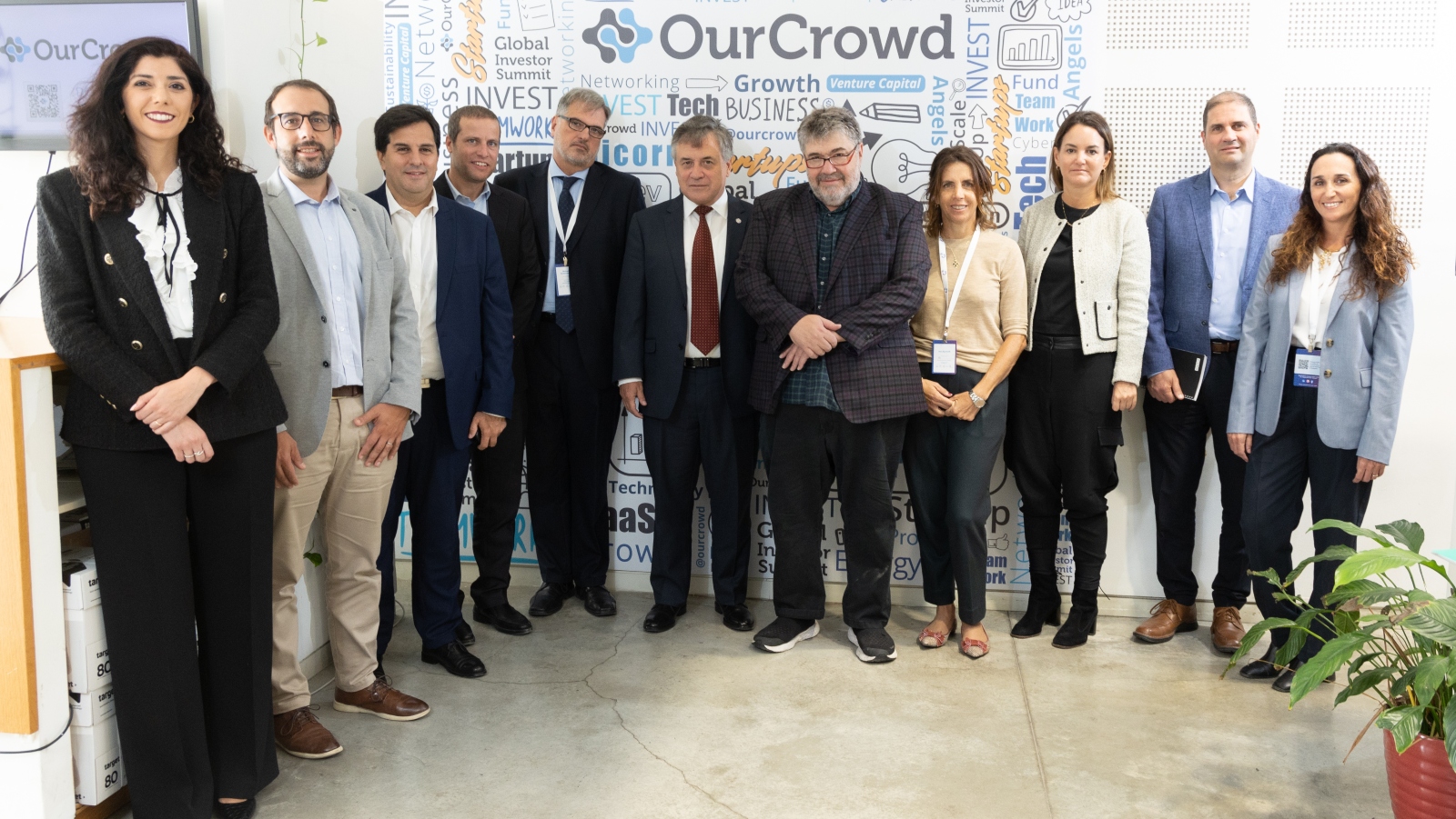 OurCrowd founder and CEO Jon Medved, center, and Head of Incubators Ori Sobovitz, fourth from left, host Uruguayan officials at OurCrowd in Jerusalem, March 26, 2023. Photo by Dudi Saad