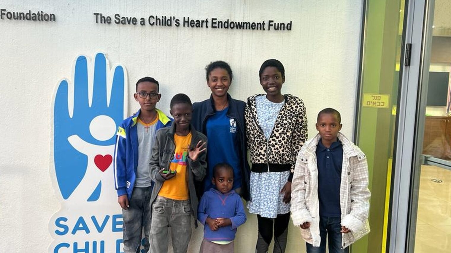 Nurse Aklil Woldegiworgis, center, with half of the children she brought from Ethiopia for treatment at Save a Child’s Heart. Photo courtesy of SACH