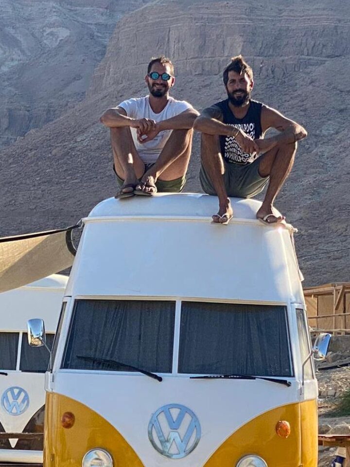 Business partners Ben Shukrun, left, and Avi Barkai with their camper vans. Photo courtesy of Ein Gedi Camp Lodge