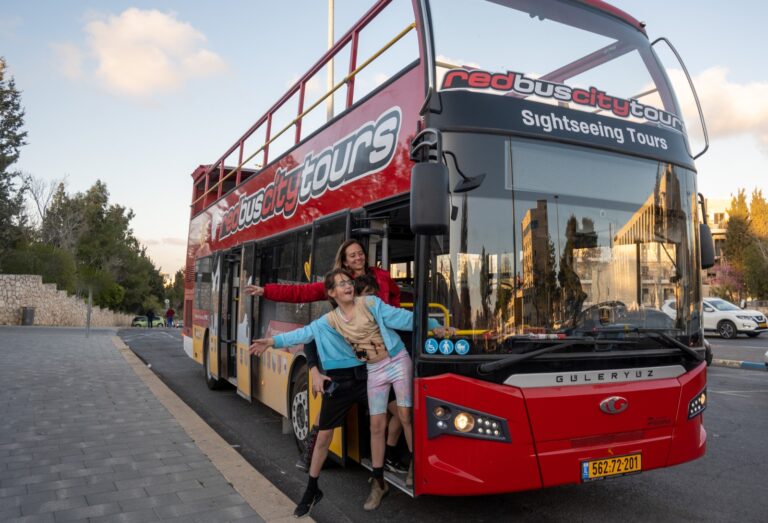 Tour Jerusalem in a red double-decker bus with narration