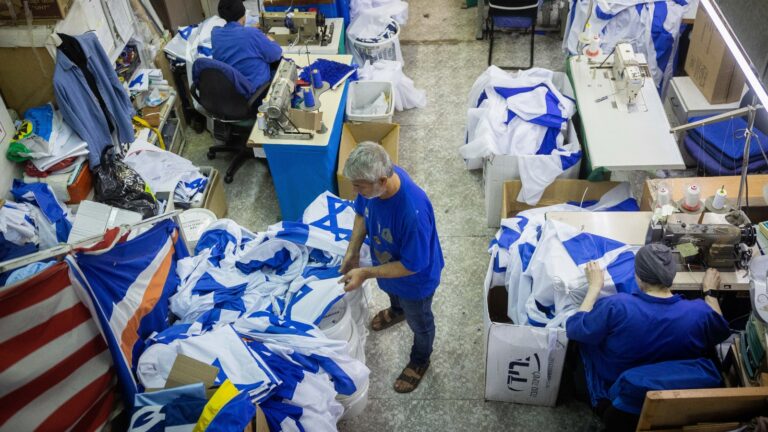 The months before Israeli Independence Day are super busy at Berman’s Flags in Jerusalem. Photo by Yonatan Sindel/Flash90