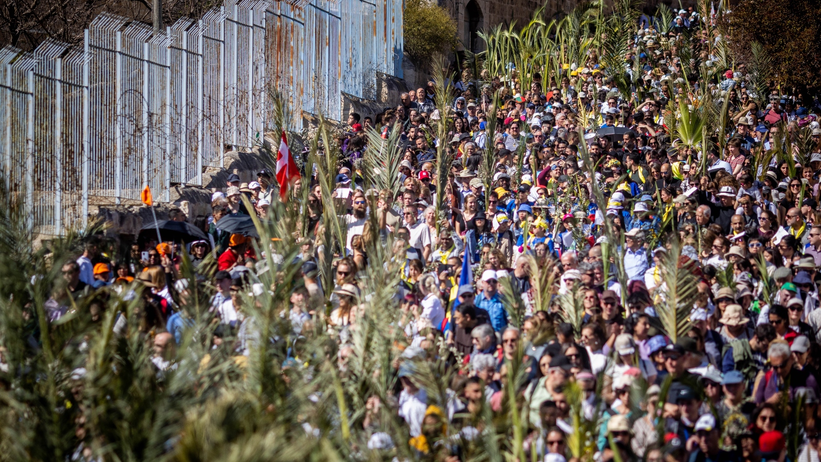 Christian pilgrims take part in the traditional Palm Sunday procession on the Mount of Olives, Sunday, April 2, 2023. Photo by Erik Marmor/Flash90
