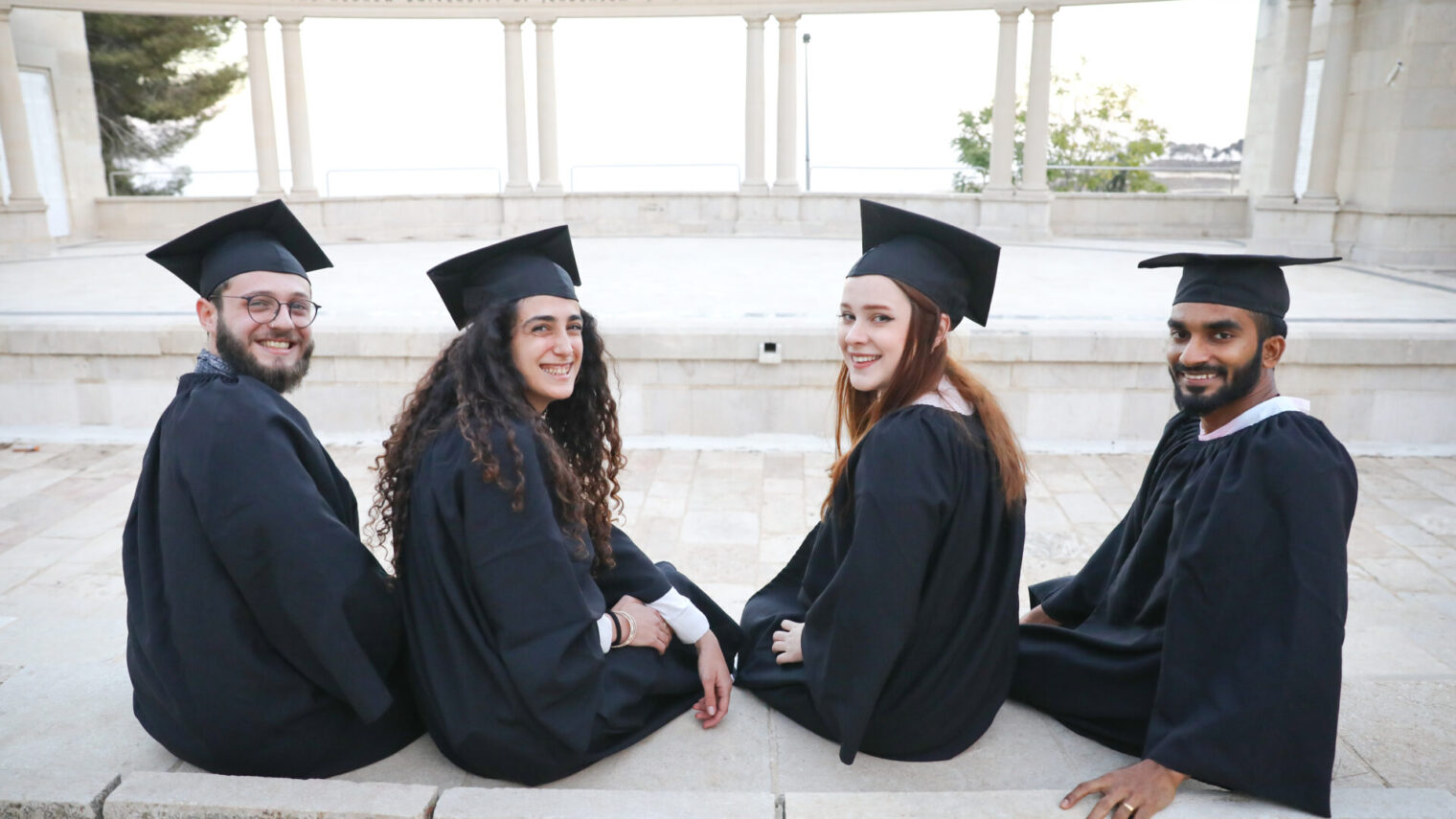 Hebrew University students prepare for graduation at the historic Rothberg Amphitheatre on the Mt. Scopus campus. Photo Credit: AFHU