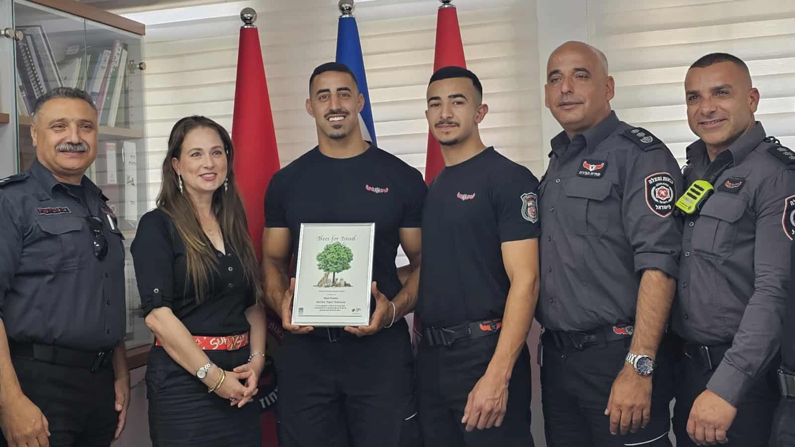 Sgt. Majd Huseen receives a certificate of appreciation for his rescue operation from the JNF-USA. Photo courtesy of the Jewish National Fund USA