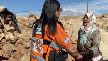 A United Hatzalah volunteer aiding a woman in the Moroccan village of Tizi Ouaddou. Photo courtesy of United Hatzalah