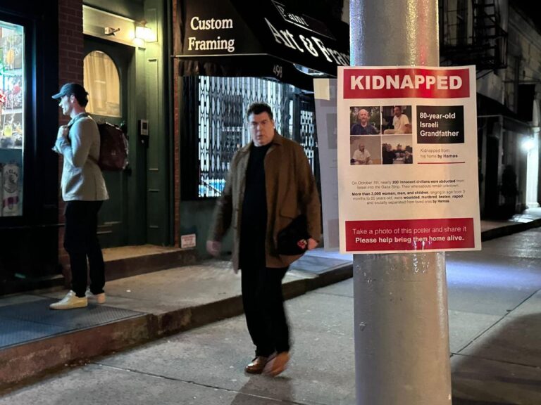 A man in New York walking past the posters. Photo courtesy of the Kidnapped from Israel campaign