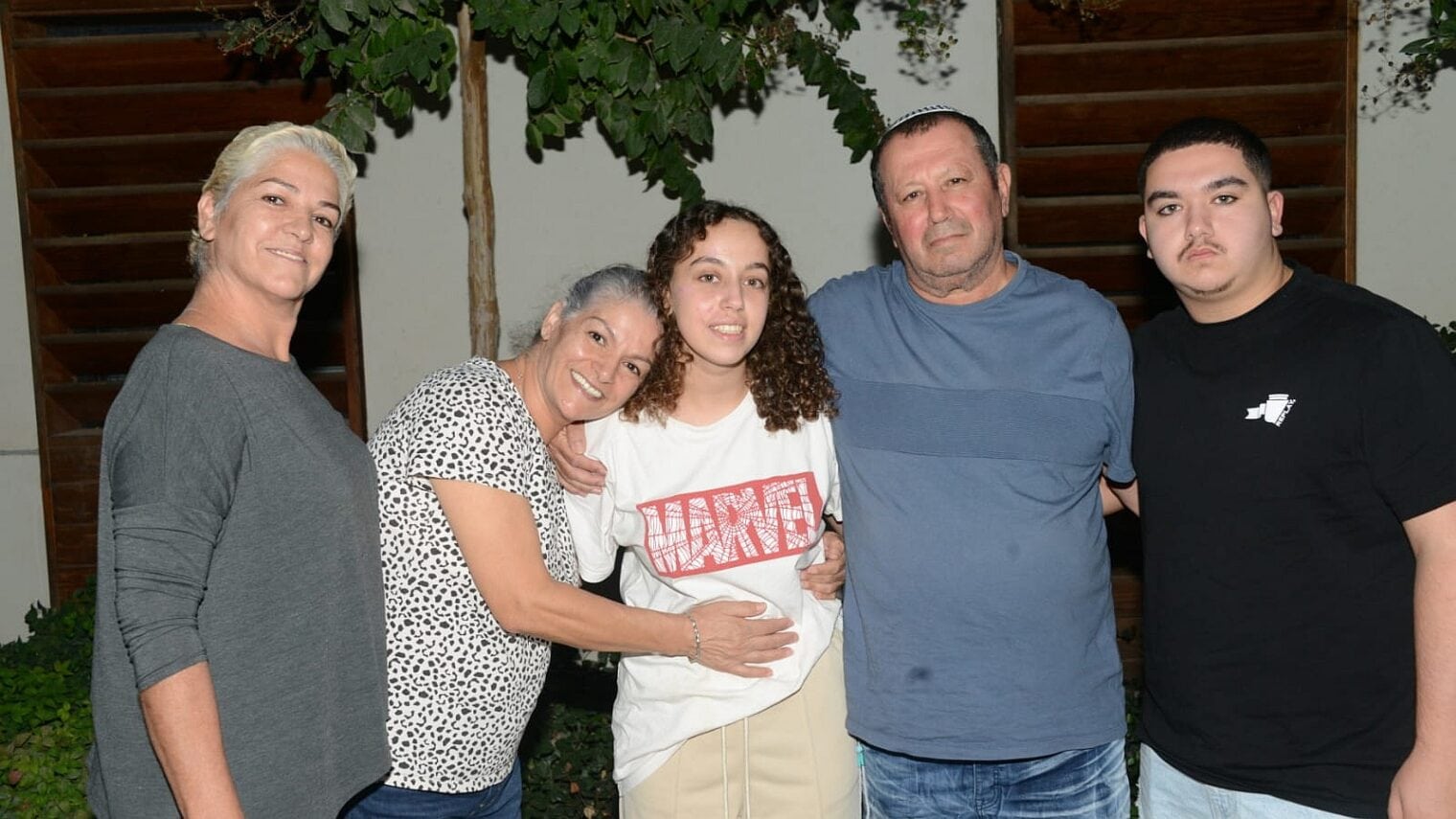 Private Ori Megidish (center) surrounded by her family after her rescue from Gaza on October 30th. Photo courtesy Shin Bet