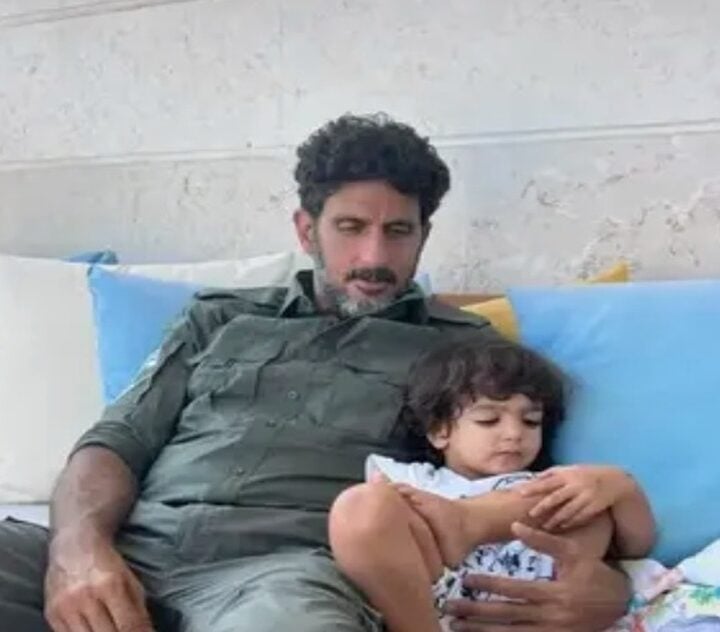 Fauda star Tsahi Halevi with his son wearing an Israeli army uniform. Photo courtesy of Lucy Aharish via Instagram