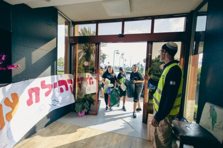Evacuees from Shokeda, Sderot and Ashkelon arriving at the Inbal Hotel in Arad. Photo courtesy of JNF-USA
