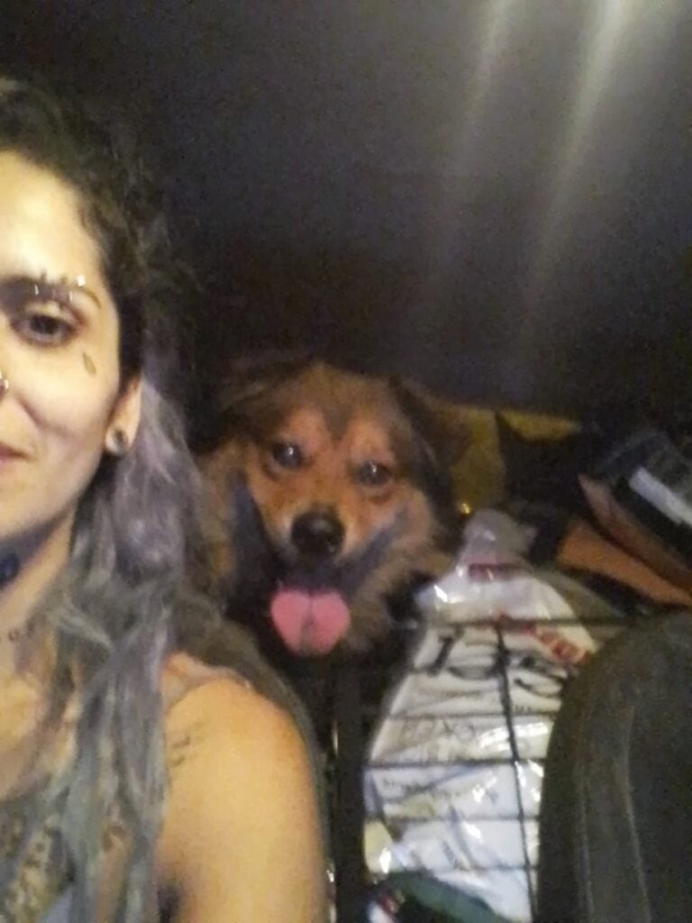 Nora Lifshitz with a rescued dog. Photo courtesy of ATALEF