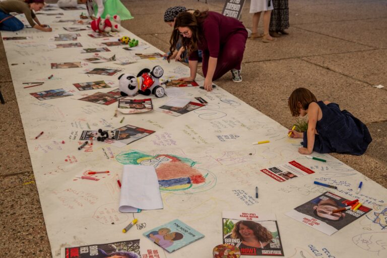People are leaving heartfelt messages at Captives Square in Tel Aviv. Photo by John Jeffay