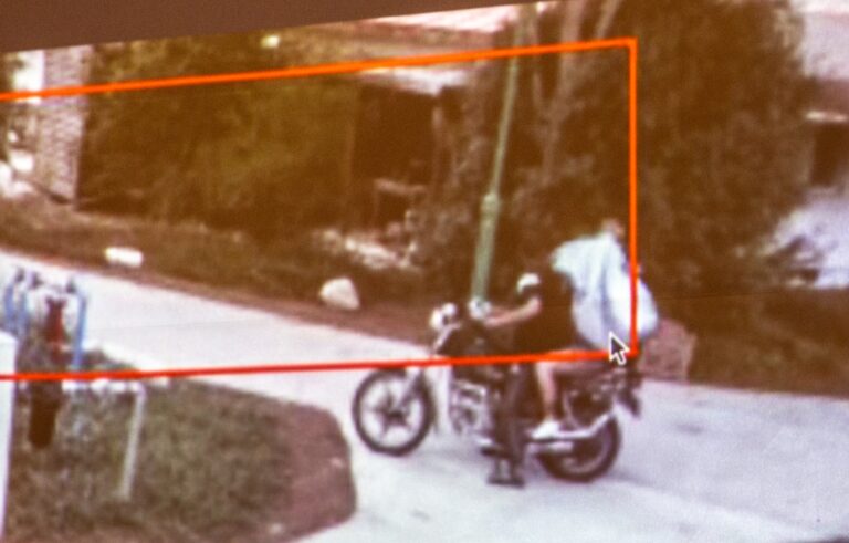 A still photo from Eyal Barad’s CCTV camera showing a neighbor being abducted on a motorbike. Photo by John Jeffay