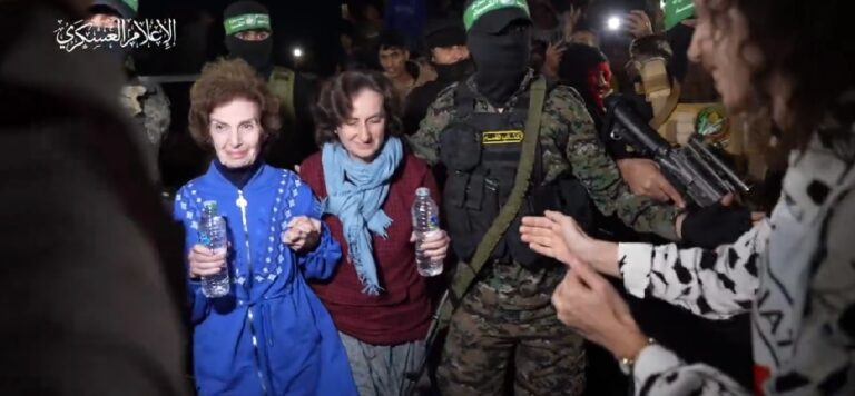 Irena Tat and Yelena Trupanov being led by Hamas terrorists into a Red Cross van. Photo via Twitter