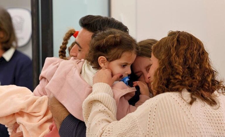 Yoni Asher is reunited with his wife, Doron, and daughters Raz and Aviv, on November 25, 2023. Photo courtesy of Schneider Children’s Hospital