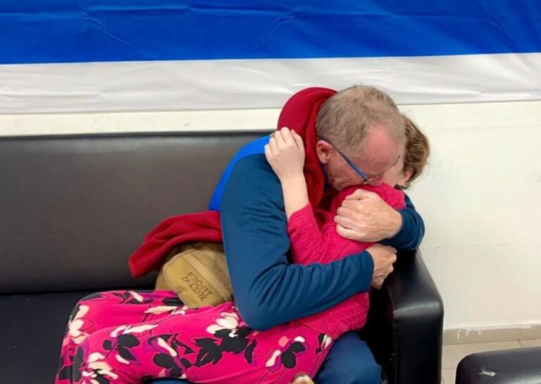 Emily Hand and her father are reunited upon her release from Hamas captivity on November 25, 2023. Photo courtesy of the IDF Spokesperson’s Unit