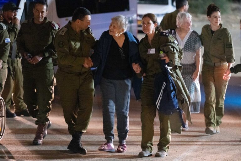 Yafa Adar, 85, is escorted back to Israel after spending nearly 50 days in Hamas captivity, on November 24, 2023. Photo courtesy of the Adar family