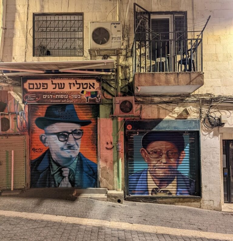 These two gentlemen appear on the shutters of Atleez butcher shop in Machane Yehuda. Photo by Solomon Souza