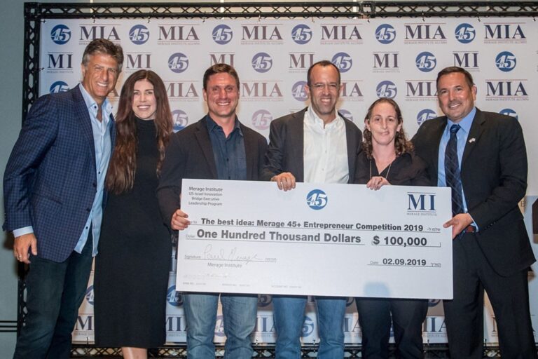 NeuroTriggerâ€™s cofounders Assaf Deutch, Shachar Paz and Michal Marks (third, fourth and fifth from left) accepting first prize in the 2019 Merage 45+ Entrepreneurs' Competition. Photo courtesy of Merage Foundation