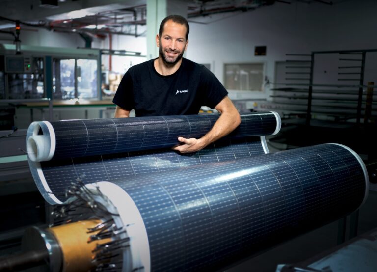 Apollo CEO Oded Rozenberg with the flexible solar panels. Photo by Rami Zarnegar