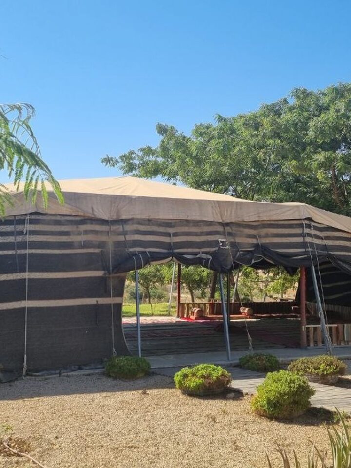 An outdoor visitor center in the shape of a traditional Bedouin husha. Photo by Yulia Karra