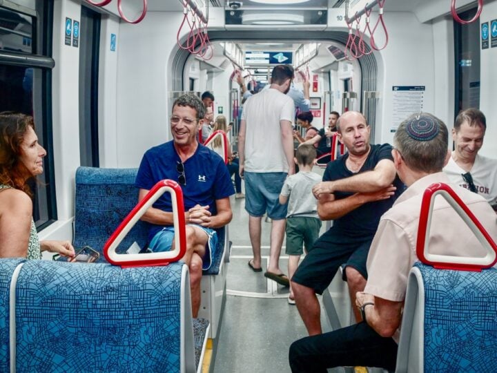 Passengers on Tel Avivâ€™s Metropolitan Light Rail chatting with each other. Photo by Avshalom Sassoni/Flash90