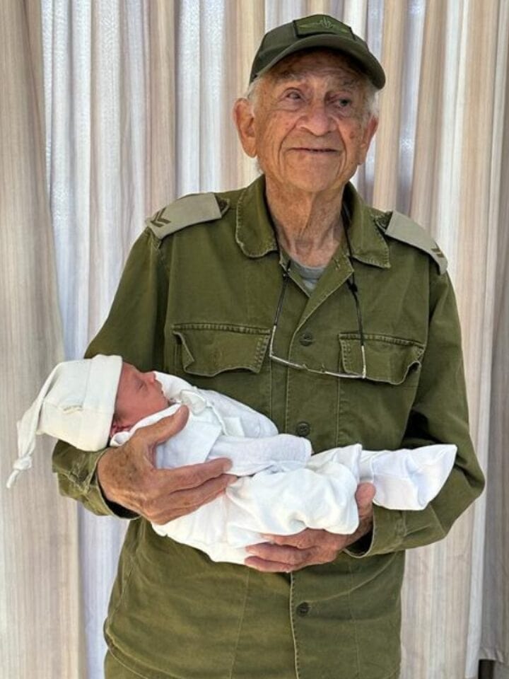 Ezra Yakhin holding his great-great grandson. Photo courtesy of Hadassah Medical Center