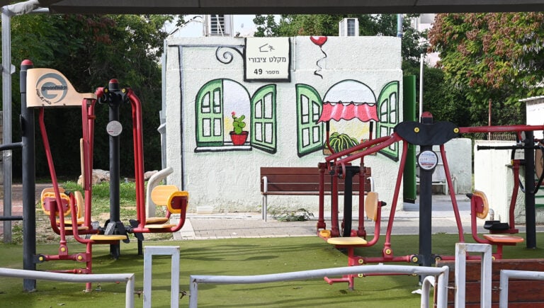 This public bomb shelter in Holon is painted to fit in with the upbeat nature of the workout apparatus in the park. Photo by Sergio Starodubtsev