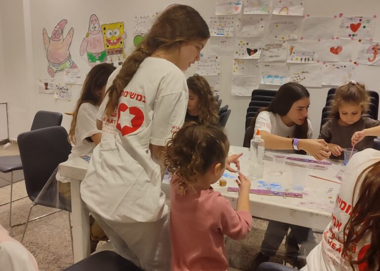 One Heart volunteers run an activity for children of families evacuated from their homes. Photo courtesy of One Heart