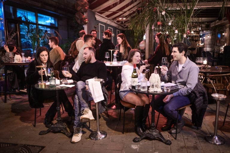 Israelis celebrating New Year's Eve at a pub in Tel Aviv, December 31, 2023. Photo by Avshalom Sassoni/Flash90