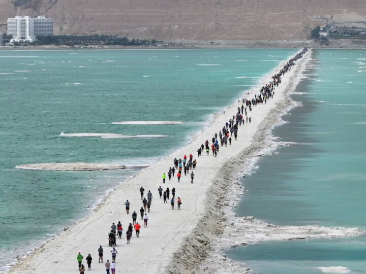 Thousands of runners crossed the Dead Sea embankment connecting Israel and Jordan during the marathon. Photo by Oren Alon