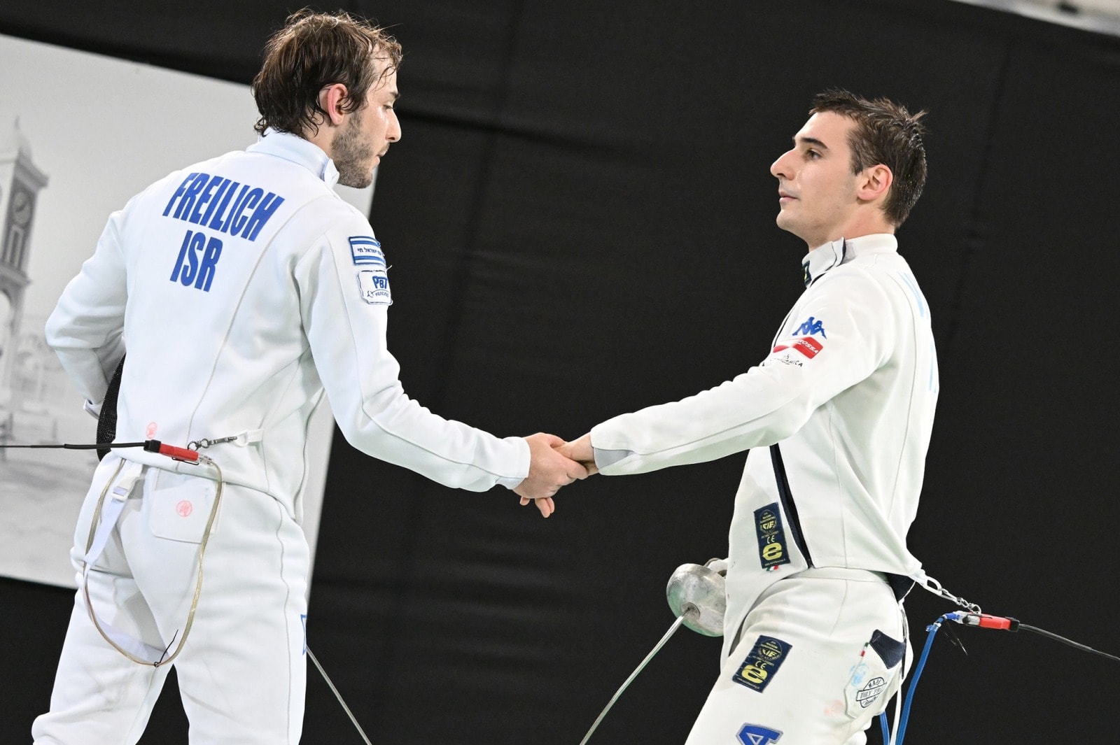 Israeli fencer Yuval Freilich shaking hands with his opponent at the 2024 Doha Grand Prix. Photo by Augusto Bizzi/courtesy of Israel Fencing Association