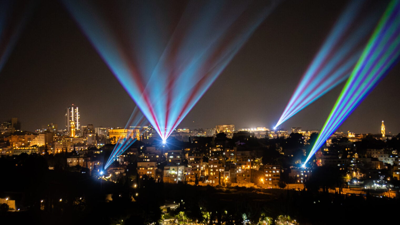 The Jerusalem laser light show in full effect over the holy city. Photo by Dor Pazuelo.