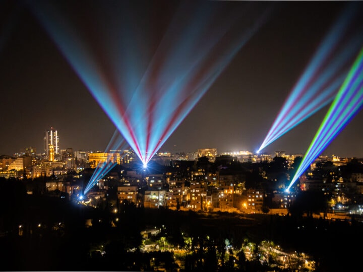 The Jerusalem laser light show in full effect over the holy city. Photo by Dor Pazuelo.
