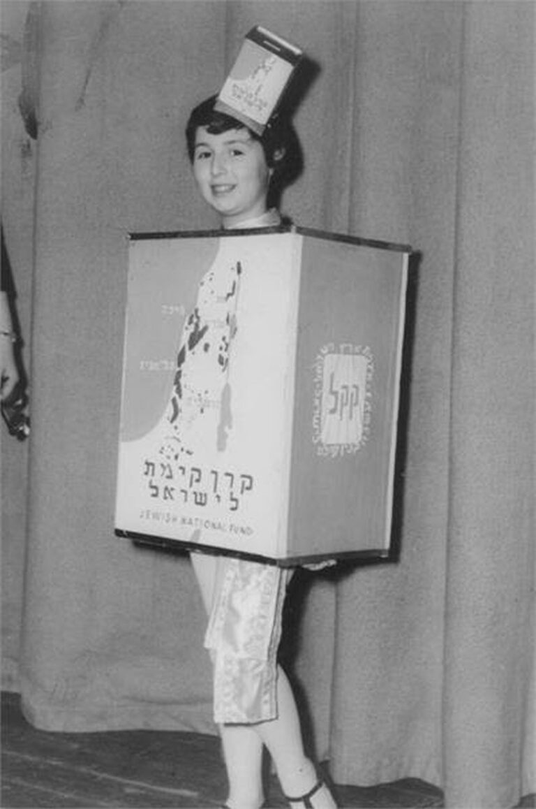 A girl dressed up as the KKL-JNF Blue Box on Purim, Germany, 1950. Photo courtesy of KKL-JNF Photo Archive