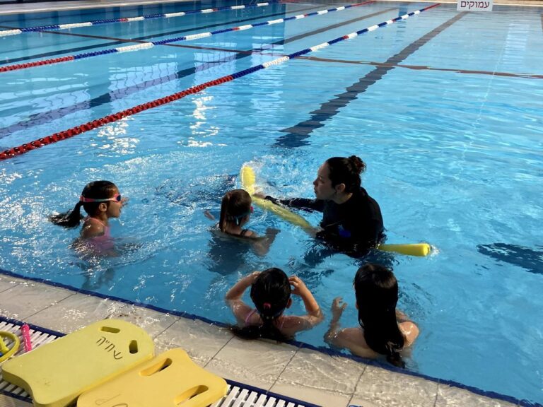 Swim school helps war evacuees overcome trauma 