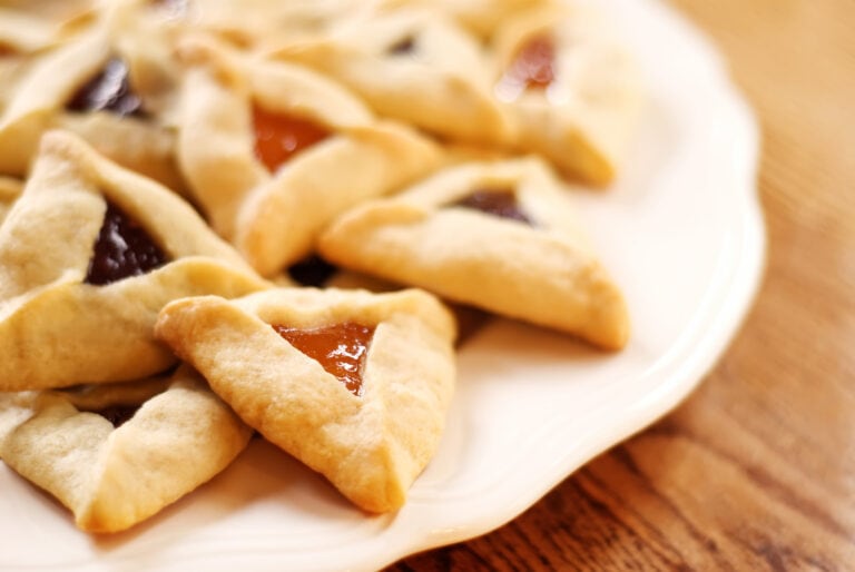 Love ‘em or hate ‘em, three-cornered hamantasch pastries are a staple of Purim. Photo by blueeyes via Shutterstock.com